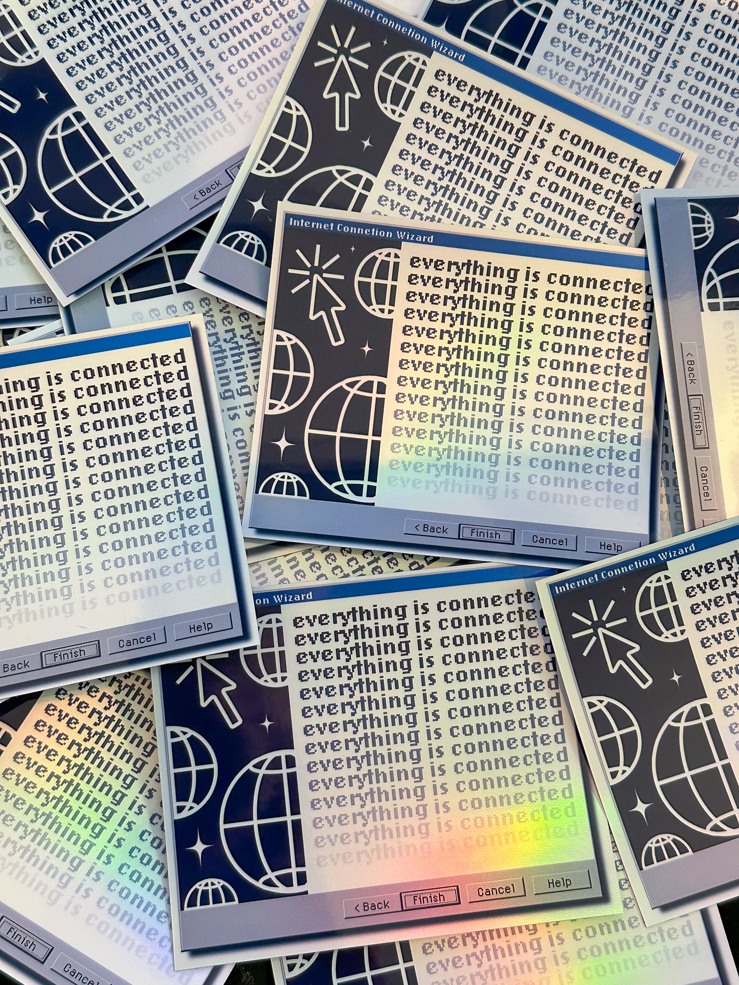 Stack of stickers with 'everything is connected' text and graphics on a colorful background