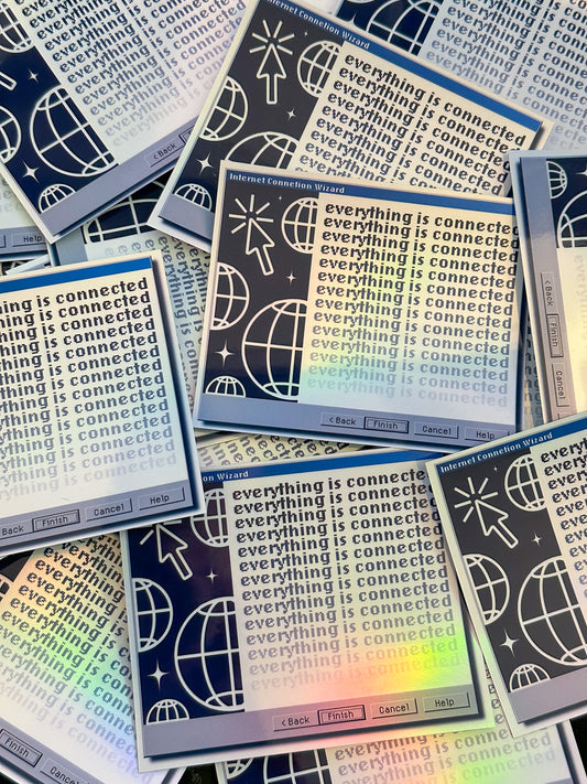 Stack of stickers with 'everything is connected' text and graphics on a colorful background